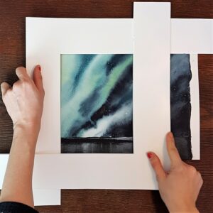 Elisabeth Biströms akvarellskola, om hur man kan testa sin komposition med hjälp av en delad passepartout